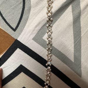 2 Silver And Gold Diamond Bracelets