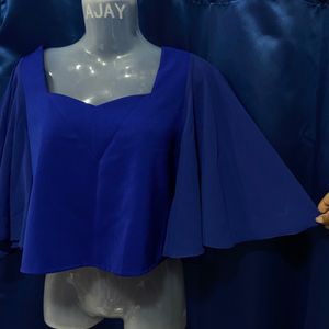 Blue Crop Top With Pretty Butterfly Sleeves.