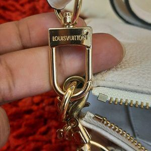 LOUIS VUITTON SLING BAG