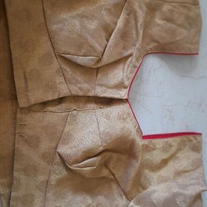 Golden silk fabric blouse stitched