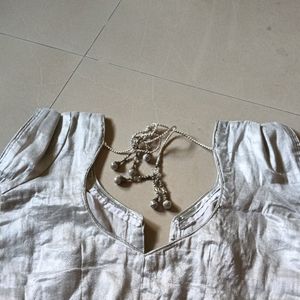 New silver blouse