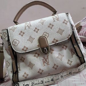 White And Cream Textured Sling Bag