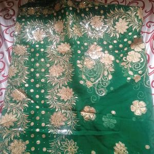 Green saree With Beautiful silver design