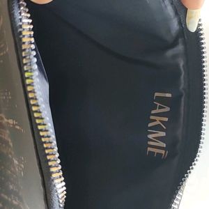 Lakme Black Pouch With Golden Detailing