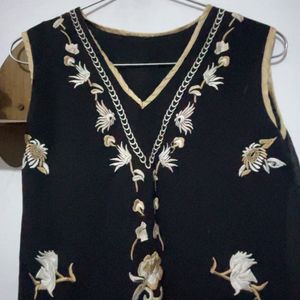 a black embroidery crop top