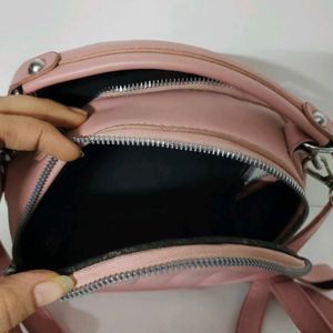 cute and pinteresty peach colour sling bag