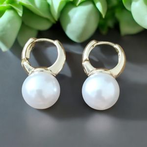 White Pearl Earings.