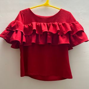 Red Top With Beautiful Flares In The Neck