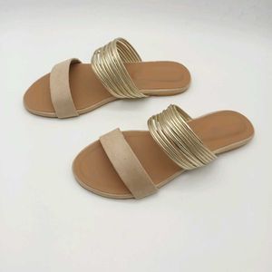 Tan And Gold Flat Sandals.