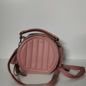 cute and pinteresty peach colour sling bag