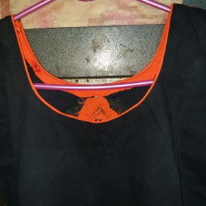 Black Kurti With Orange Pipean And Deep Back Detai