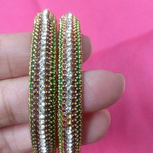 1 Set Of Bangles(Red Green Color & White Stones)And 1 Set Of Silk Thread Earrings (Yellow Color)