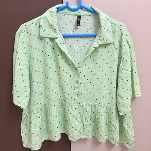 Green Peplum Top With Polka Dots