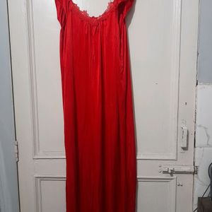 red color satin nighty and golden clutch