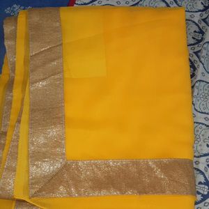 Plain yellow sari