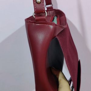Adjustable sling handbag