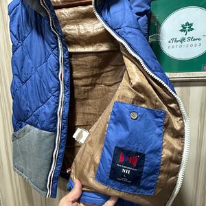 NII Quilted Sleeveless Blue Hooded Jacket