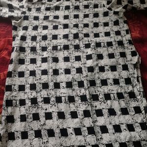 Beautiful White Checked A-line Women Kurta🤍