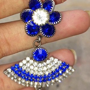 A Beautiful Blue Earing With The Studs