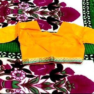 IT IS A MUSTARD COLOR WOMEN'S BLOUSE....