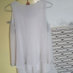 White Sleeveless Top