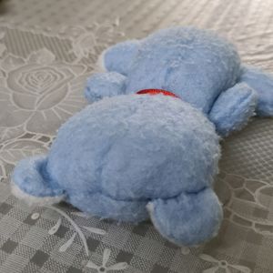 Sky Blue Teddy Bear with Red bow...a Stuffed Toy