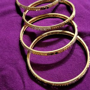 4 Bangles And 1 Bracelet