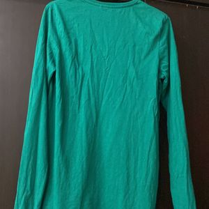 A Green Long Sleeve Shirt Suited for 13 to 14 Yrs