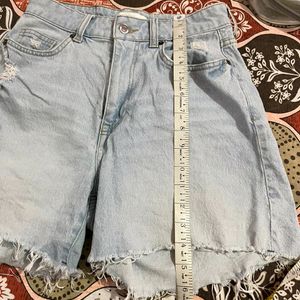 H&M light blue washed ripped shorts