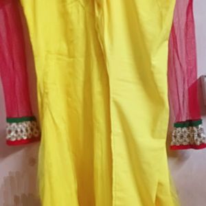 Yellow Net Frock With Churidar Pajama and dupatta