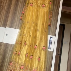 Yellow Colour Net Gown Full Slvees