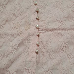 Pink net kurta with pearl buttons