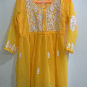 Yellow Kurti with half net and chikankari work