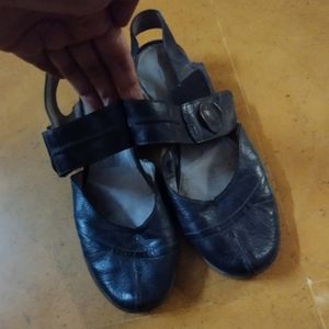 Black flat closed toe sandals