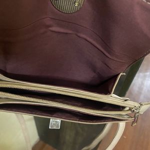 Caprese Khaki Colored Bag With Good Storage.