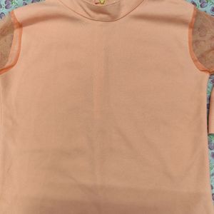 A Peach Trendy Top With Frills Sleeves