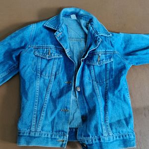blue denim jacket with open buttons