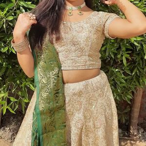 Cream Colour Lehenga Choli With Green Dupatta