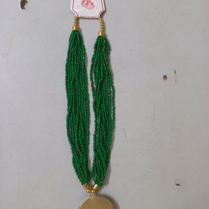 MULTILAYERED GREEN BEADS NECKLACE