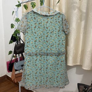 Sea Green Knee-length loose fit dress.