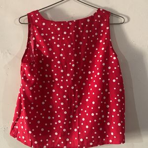 red sleeveless top