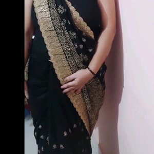 Black Party Wear Saree With Golden Jari Work