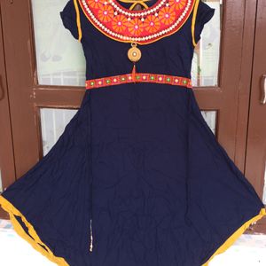 Flared Women Kurti With Rajasthani Work .