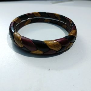 Red, gold, black braid bangle