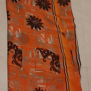 orange soft saree with black designs