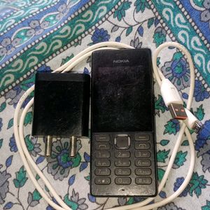 A  Nokia Phone With Charging Cable Type B