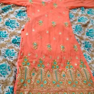 Embroidery With Some Stone Work Kurti.