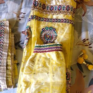 Heavy Yellow Color Net Lehnga Choli