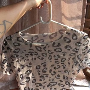 BRAND NEW URBANIC top with White Leopard Print.