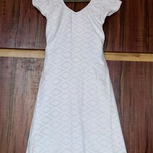 Printed white coloured Kurti.